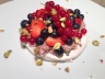 Pavlova with fruits and pistachios
